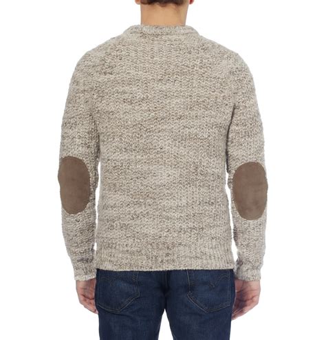 sweaters with suede elbow patches.